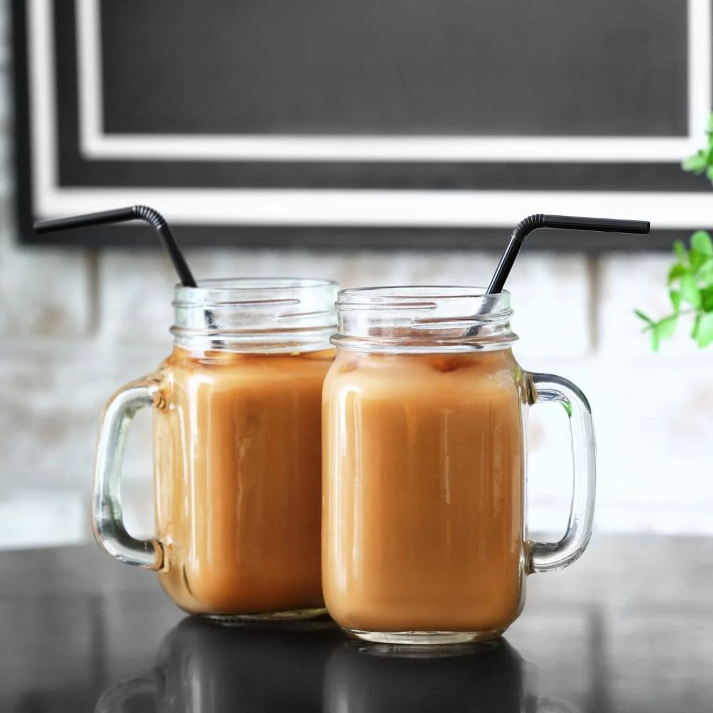 Two iced coffees in mason jars from Sun Soaked Coffee Company